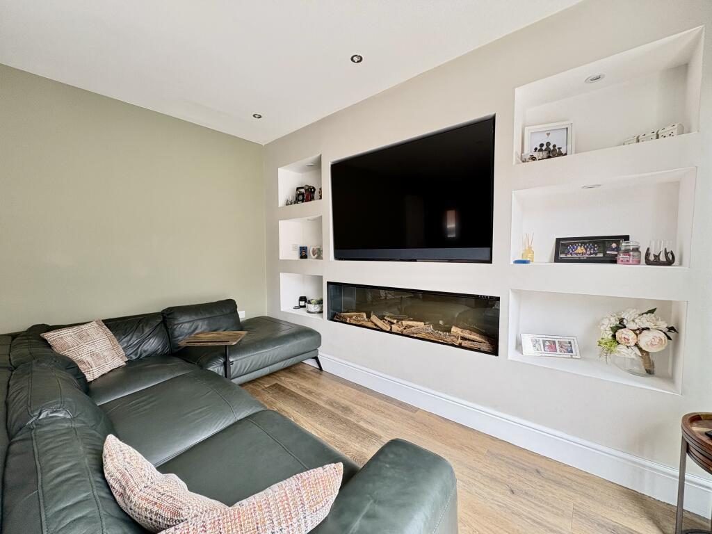 Media wall with built-in alcove shelving